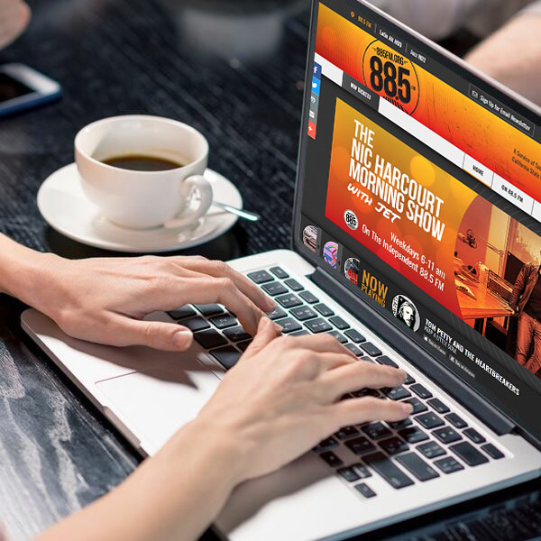 Computer with The SocalSound website on it