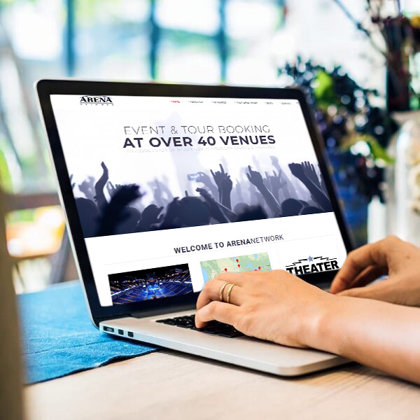 Computer with The ArenaNetwork website on it